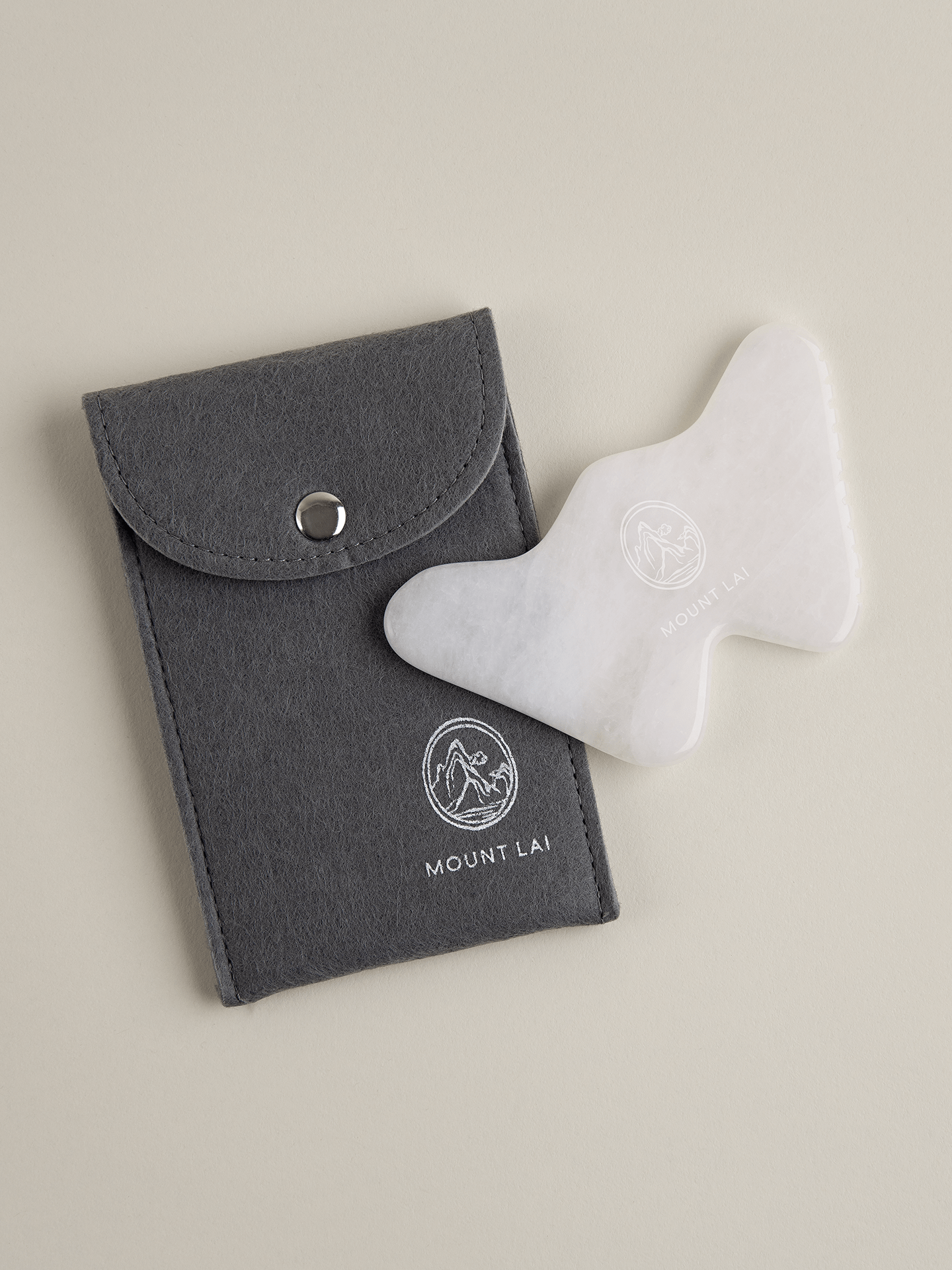 The Vitality Qi White Jade Gua Sha Sculpting Tool with Protective Pouch