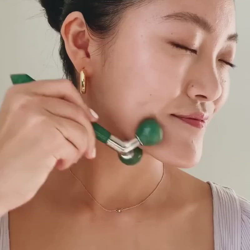 Load video: The Rose Quartz Tension Melting Massager for Face &amp; Neck